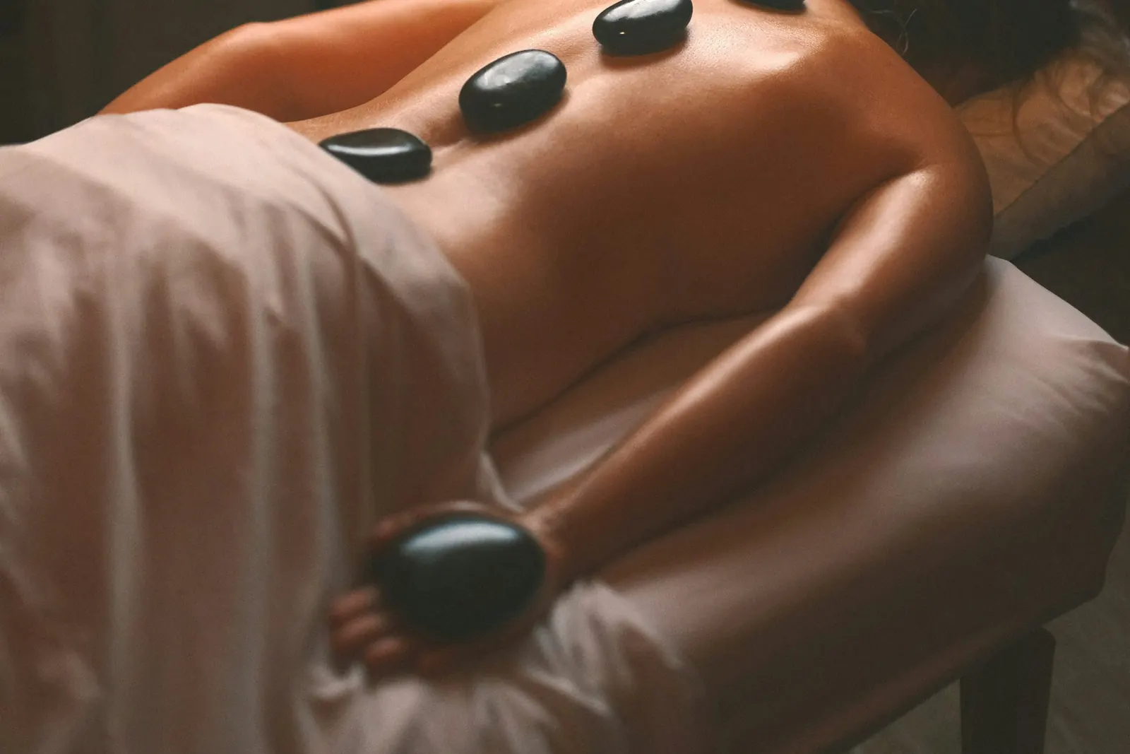 A relaxing massage with warm stones